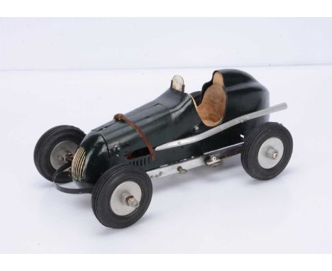 A small Diesel-Engined Tether Racing Car, measuring approx 350mm overall, with appearance of being a commercial/kit-built mod