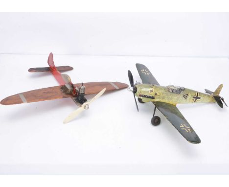 Two small Diesel-engined Control-line Model Monoplanes, one a German fighter aircraft in 'camouflage' colours with No. 7 and 