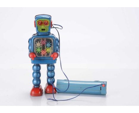 A Yoshiya (Japan) Tinplate Remote Control High-Wheel Robot, blue tinplate body, K.O trademark to rear, red feet, clear plasti