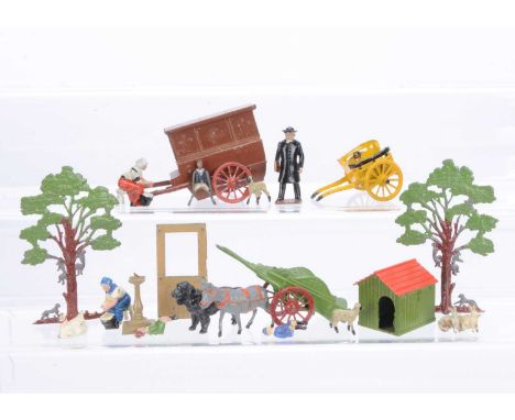 A lot of lead farm and garden items by various makers including Britains and Charbens comprising Taylor & Barrett Monkey Tree