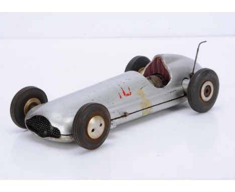 A small Diesel-Engined Tether Racing Car, appears to be a commercial product, measuring approx 300mm overall, with aluminium 