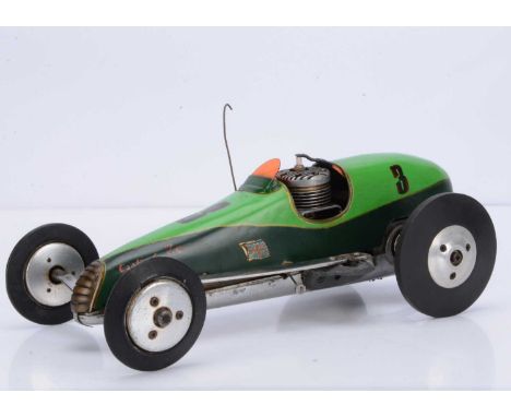 A Petrol-Powered Model 'Dragster-style' Tether Racing Car, measuring approx 380mm long overall, the cast aluminium chassis fi