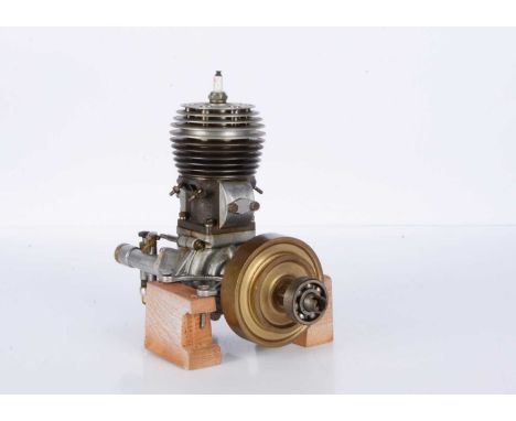 A single-cylinder 2-stroke Petrol engine for Marine or Stationary use,  the cylinder appears approx 25mm x 25mm, fitted with 