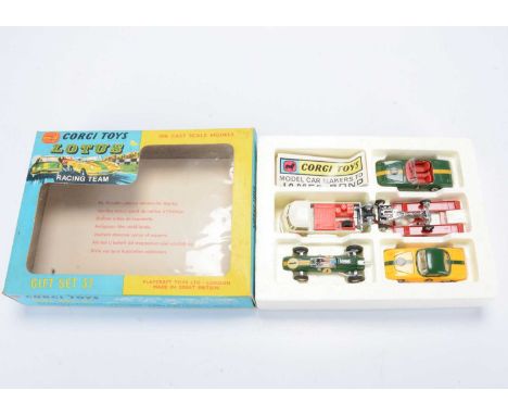 A Corgi Toys Gift Set 37 Lotus Racing Team, comprising 490 VW Breakdown Truck, red trailer, 318 Lotus Elan S2 Open Top, 319 L