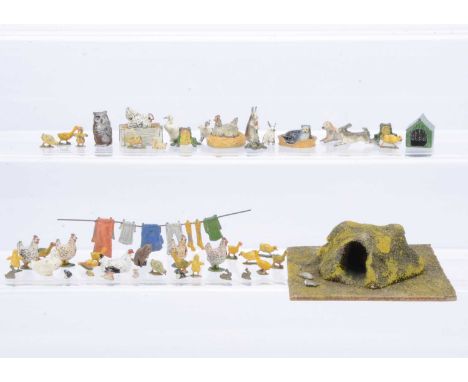 Small animals by various makers including Britains and Barrett & Sons comprising Rabbit Warren in the style of Hugar but unkn