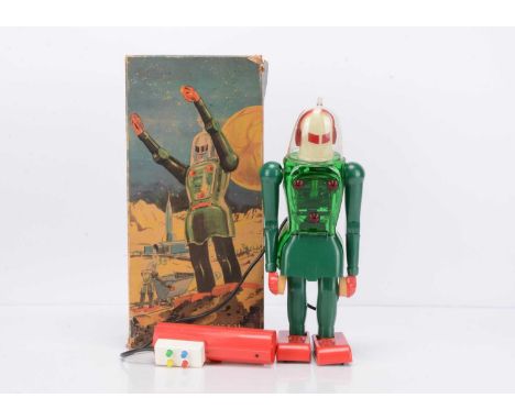 A Dux (West Germany) Astroman Plastic Battery-Operated Remote Control Robot, transparent green plastic body with white head u