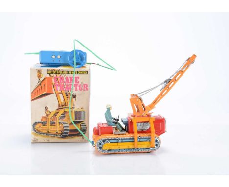 A Swallow Toys (Japan) Tinplate Battery-Operated Remote Control Crane Tractor, No.3H-203, red body, orange crane, detailed ti