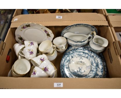 A Duchess part tea service with autumnal decoration and a Savoy part dinner service with blue decoration.