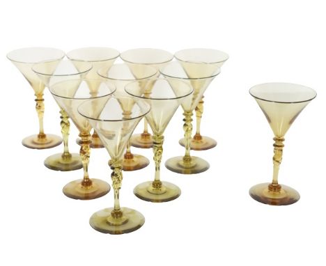 (11) Steuben amber wine glasses with twisted stems. Size: 5 3/4 x 3 1/4 in. Please note that all sales are final. No refunds 