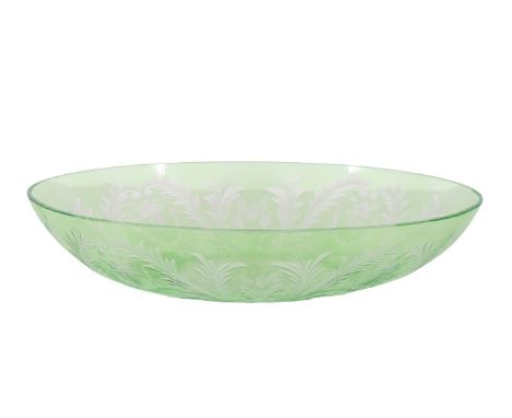 This is a green Steuben oval bowl with floral motif design. Size: 3 x 14 in. Please note that all sales are final. No refunds