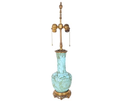 A Signed Steuben lamp with a floral design. Size: 28 x 6 in. Please note that all sales are final. No refunds will be given u