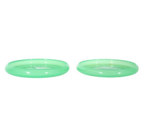 Pair of Steuben jade green shallow bowls. Size: 5 1/4 in. Please note that all sales are final. No refunds will be given unde