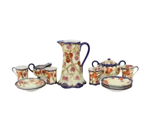 Hand painted tea set, floral design. Sizes: Pitcher: 7 1/2 x 5 1/4 in. Cup: 2 3/4 x 3 in. Cream 3 1/4 x 4 1/2 in. Sugar 4 x 6