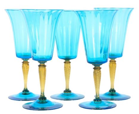 Steuben celeste blue and amber wine glasses. Shape #3551, signed, with twisted stems. Size of each: 4 x 8 in. Please note tha