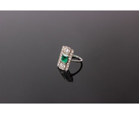 An Art Deco platinum, emerald and diamond panel ring, stamped platinum 