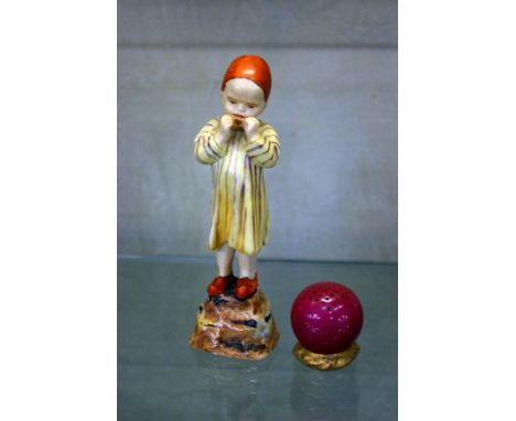 A Royal Worcester porcelain model of Egypt by Doughty, 14cm and a pepper