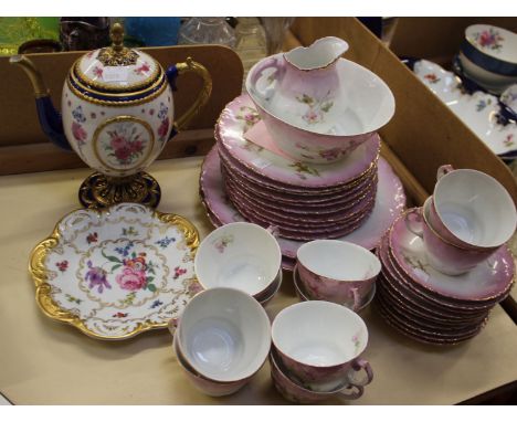 A continental porcelain part tea service together with a 'Faberge Egg' coffee pot and other continental porcelain