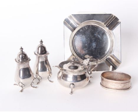 A silver salt cellar, F & Co, Birmingham, 1904, pair of shakers, napkin ring and ashtray 6ozt 