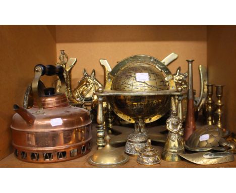 A large collection of brassware including hunting horn, kettles and globe