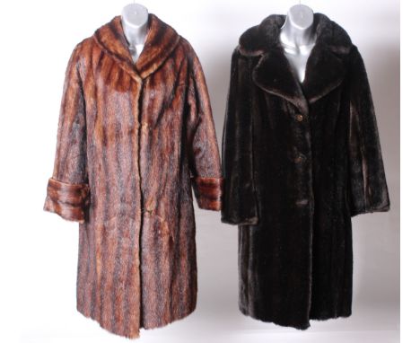 A 1950s knee length fur coat; a Victor Segall mahogany coloured fur coat, a three-quarter length astrakhan coat, a Tescan bea