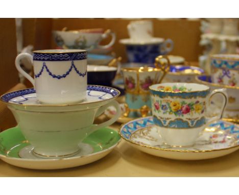 A collection of porcelain tea and coffee cups and saucers