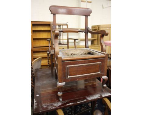 A mahogany dining table, a set of four oak dining chairs, a commode chair and one other chair 