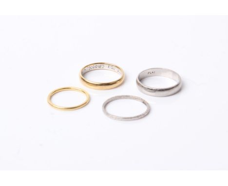 Two early 20th century platinum bands, 6.6g, a yellow metal band ring, marked 1.4g 'FH' and a reproduction posy ring  inscrib