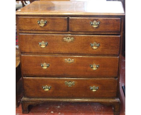 A George III oak straight front chest  three long and two short drawers on bracket feet, good patina. Width 96 cm
