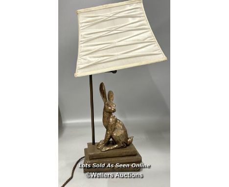 A modern lamp with Rabbit on books base, untested, 56cm high including lamp shade / AN26