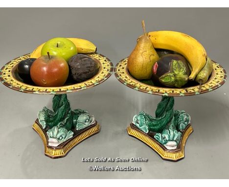 A pair of Wedgwood majolica glazed 'Tazza' bowls, with pierced edges over green fish, 17.5cm high, 24cm diameter. Includes a 