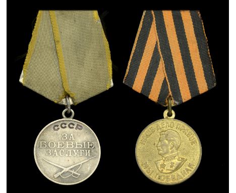 A Second War Soviet Union pair awarded to Guards Private Evdokii Petornva Volobuyeva, a female medic serving with the 270th G