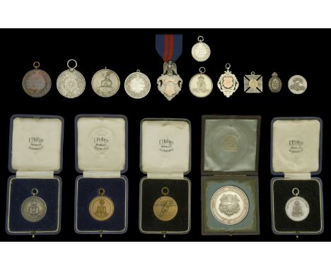 An exceptionally fine Cambridge University Rifle Volunteers Silver Medallion, by Munsey, Cambridge, 50mm, silver, engraved to