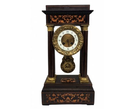 Antique French portico clock from the 19th century, 'Empire' style period, made of wood, gilded brass and enamel, decorated w