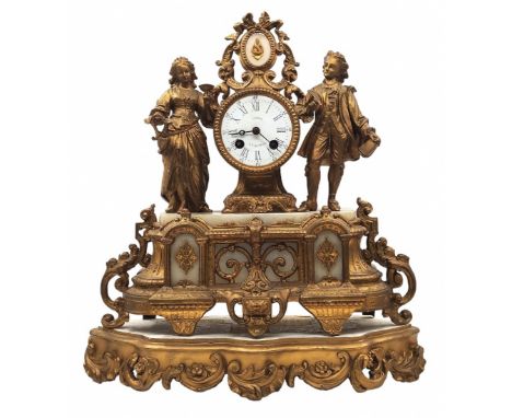 Antique mantle clock from the 19th century, apparently French, made of gold-painted spelter and white alabaster marble, paint