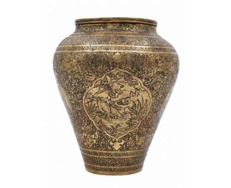 An antique Persian urn, an urn from the 19th century, made of brass and decorated with delicate hand-engraved decorations by 