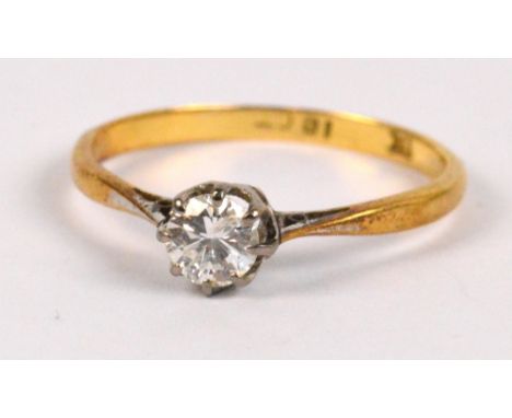 An 18ct yellow gold diamond solitaire ring, the round cut stone weighing approx 0.25ct in pierced claw mount, size L/M, appro