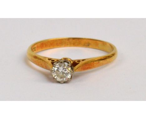 An 18ct yellow gold and brilliant cut diamond solitaire ring, the stone in high claw setting approx 0.25ct, size N/O, approx 