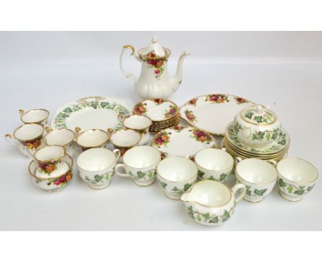 A Royal Albert "Old Country Roses" six setting coffee service, also a Wedgwood ivy decorated tea service.