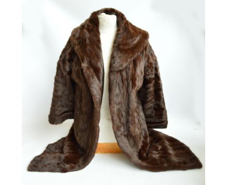 A lady's vintage full length silk lined fur coat.