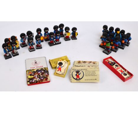 A collection of various predominantly Jazz Band golly figures, also some footballer examples, a collection of similar enamel 