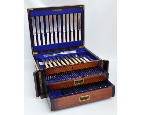 An early 20th century mahogany electroplated twelve setting cutlery comprising table forks, dessert forks, teaspoons, ivorine