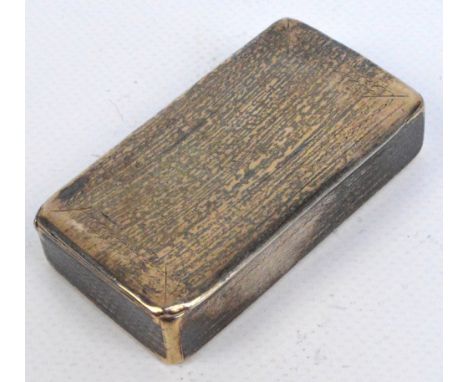 A George III hallmarked silver snuff box of rounded rectangular form with overall engine turned decoration, centred with a va