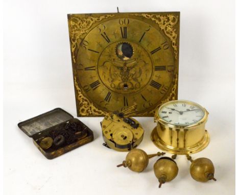 A late 18th/early 19th century longcase clock movement and brass square dial with circular chapter ring set with Roman and Ar