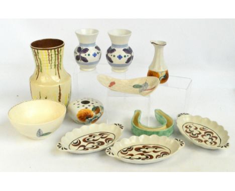 A collection of Radford ceramics including a large vase, a set of three fluted edged bowls, a pomander, a horse shoe vase, a 