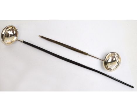 A George III hallmarked silver toddy ladle with plain oval bowl with flared rim and wrythen baleen handle, probably Stephen A