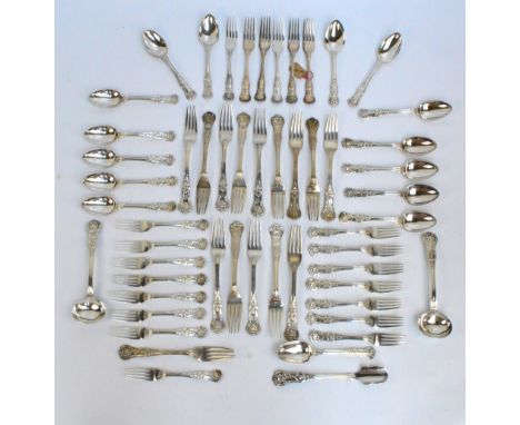 A set of Victorian hallmarked silver Kings pattern flatware crested with Dixon family coat of arms to the finials, comprising