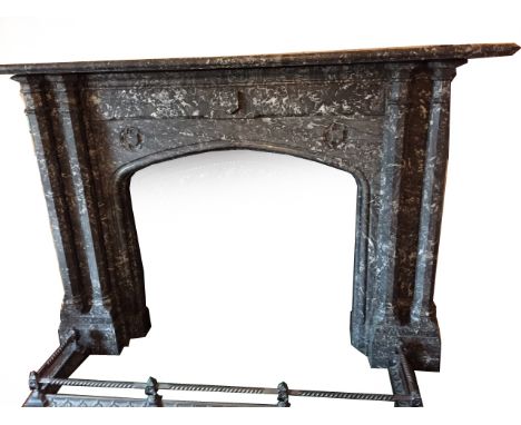 A substantial mid 19th century grey veined marble fire surround of Gothic design, with a pair of andirons and fender.
Please 