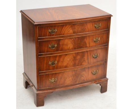 A reproduction mahogany bowfronted chest of four long drawers, on bracket feet, width 78cm, height 84.5cm.