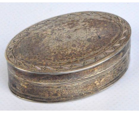 A George III hallmarked silver oval snuff box with decorative pin pricket band to the detachable lid and to the base, John Ta