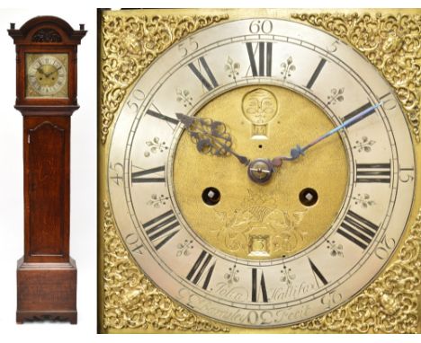 An early to mid 19th century oak eight day longcase clock, the square brass dial with silvered chapter ring set with Roman nu